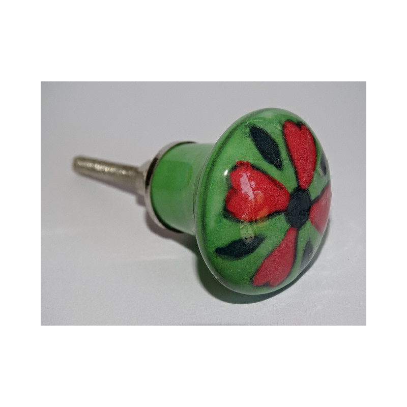 green pear shaped button and red flower