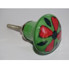 green pear shaped button and red flower