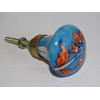 bouton en forme de poire turquoise et fleur orange
