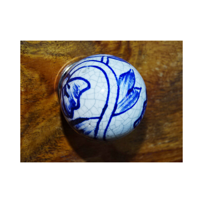 Handle ball dark blue cracked effect.