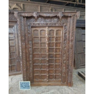 Old doors decorated with a carved lintel 142x18x224 cm