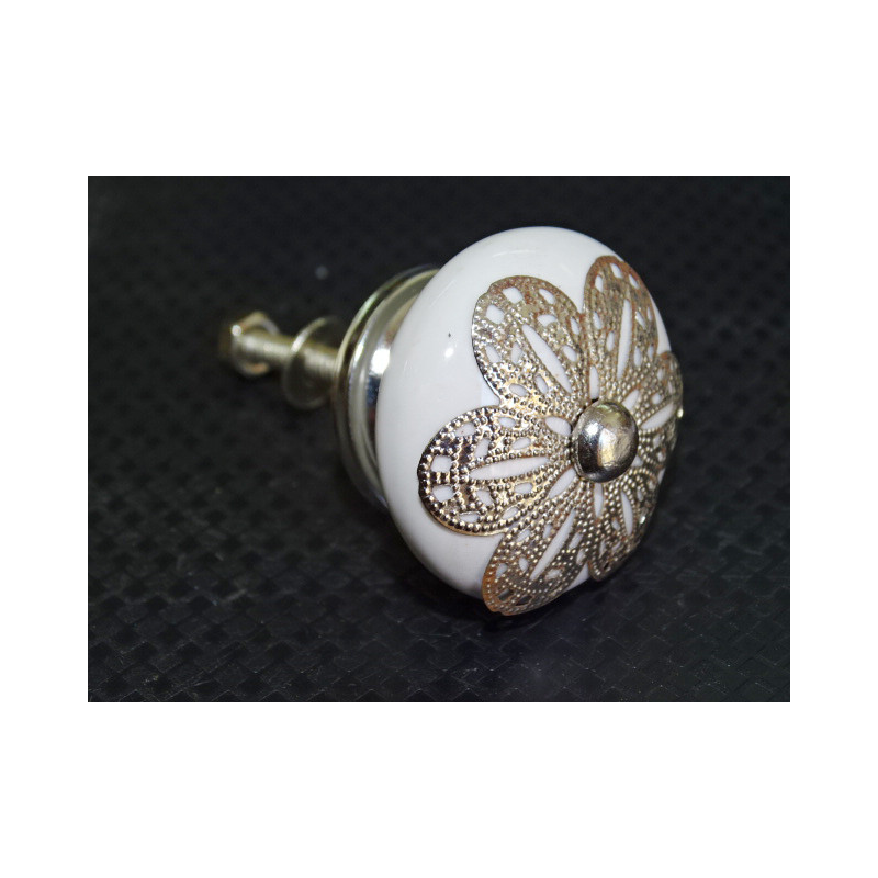 White porcelain handle with daisy metal ornament