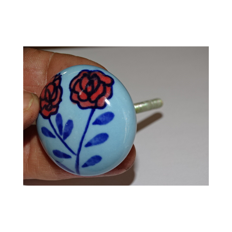 Handle of furniture with two roses
