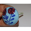 Handle of furniture with two roses