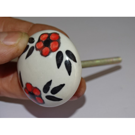 Handle of round furniture of red and black flowers