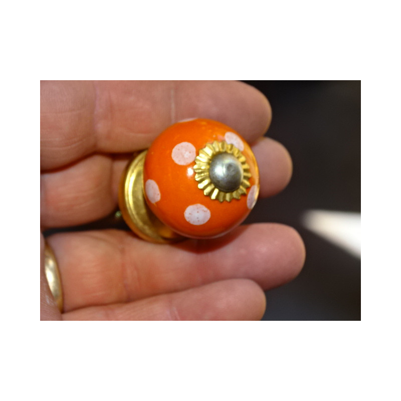 Kleine orange Griffe mit weißen Punkten