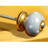 Piccole maniglie in grigio porcellana puntini bianchi