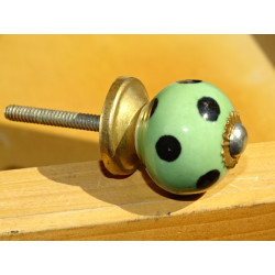 Small green handles with black dots