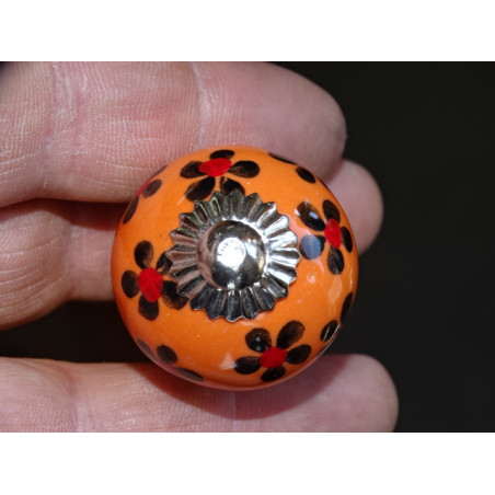 mini botones de cerámica naranja y flor negra - plata