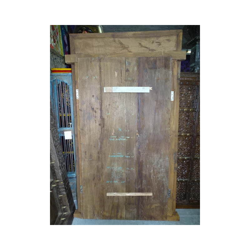 Patinated house door in dark with steel fittings