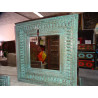 Large mirror carved and patinated in turquoise 90x90 cm
