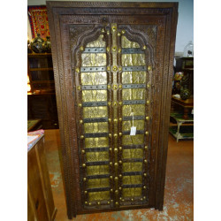 Old cabinet doors decorated with camel motifs brass plates