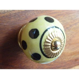 Boutons jaune pastel pois noirs