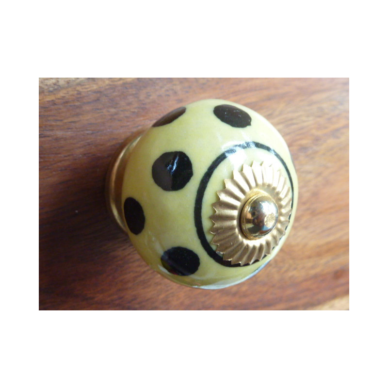 Boutons jaune pastel pois noirs