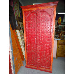 Wardrobe with arched doors and red and orange metal