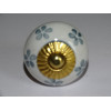 White drawer or door knobs and gray flowers