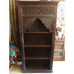 Arched rosewood bookcase with dark patina
