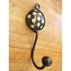 Black round ceramic hook with white polka dots