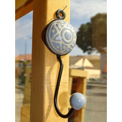 round porcelain coat rack with star embossed gray color