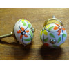 Manija de flores de porcelana de color amarillo y naranja