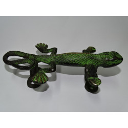bronze handle in the shape of a green patinated salamander