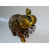 Elefante ceremonial con campana y pátina dorada y marrón