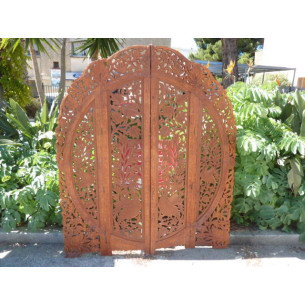 wooden partition with clear skated peacocks
