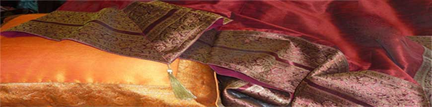 Range of cushions, tablecloths, brocade curtains
