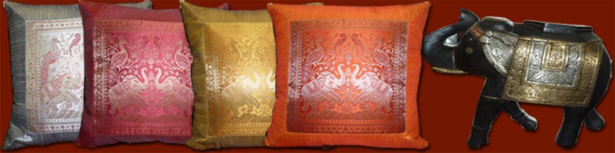Edge Cushions and two elephants, Indian furniture.