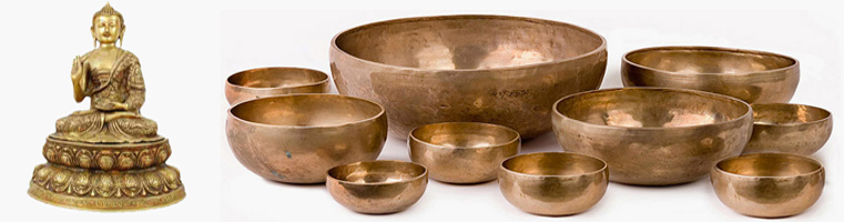 Singing bowls from Nepal handicrafts . These bowls have a sculpted interior (Buddha or other) and damask on the outside.