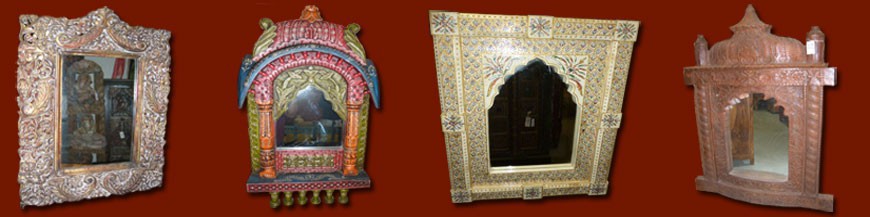 Specchi indiani dipinti a mano o intagliati . Vecchi o nuovi specchi realizzati attraverso tecniche artigianali indiane.